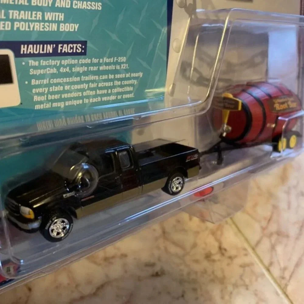 Johnny Lightnings Tow & Go 2003 Ford F-250 + Barrel Concessions Limited 1/4000